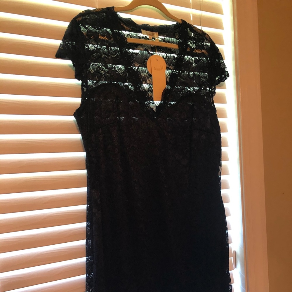 Beautiful navy blue lace dress...Fits like an XXL